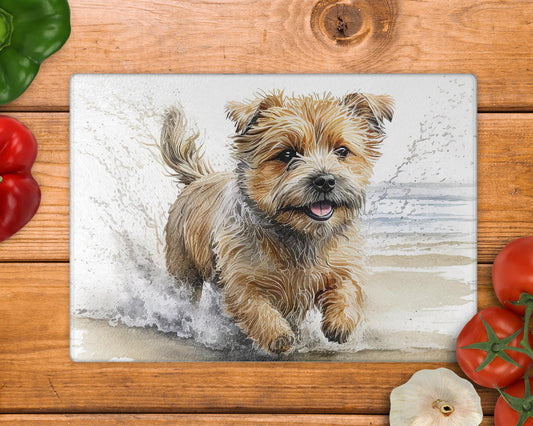 Norfolk Terrier Running Beach 8inch x 11inch Glass Chopping Board